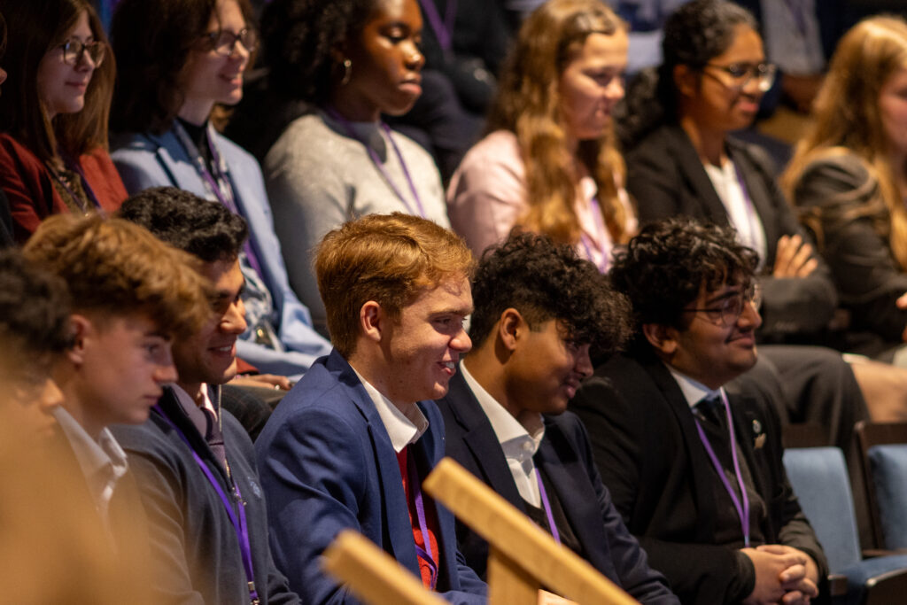 Audience attentively listening to presentation.