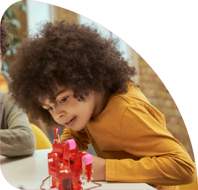Child engaged in creative activity.