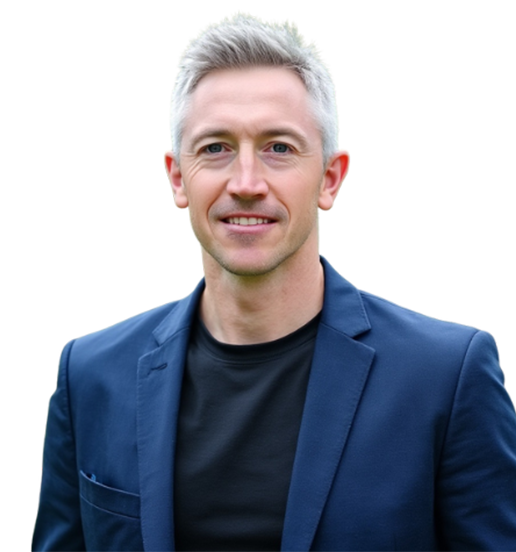 Man in blazer against black background.