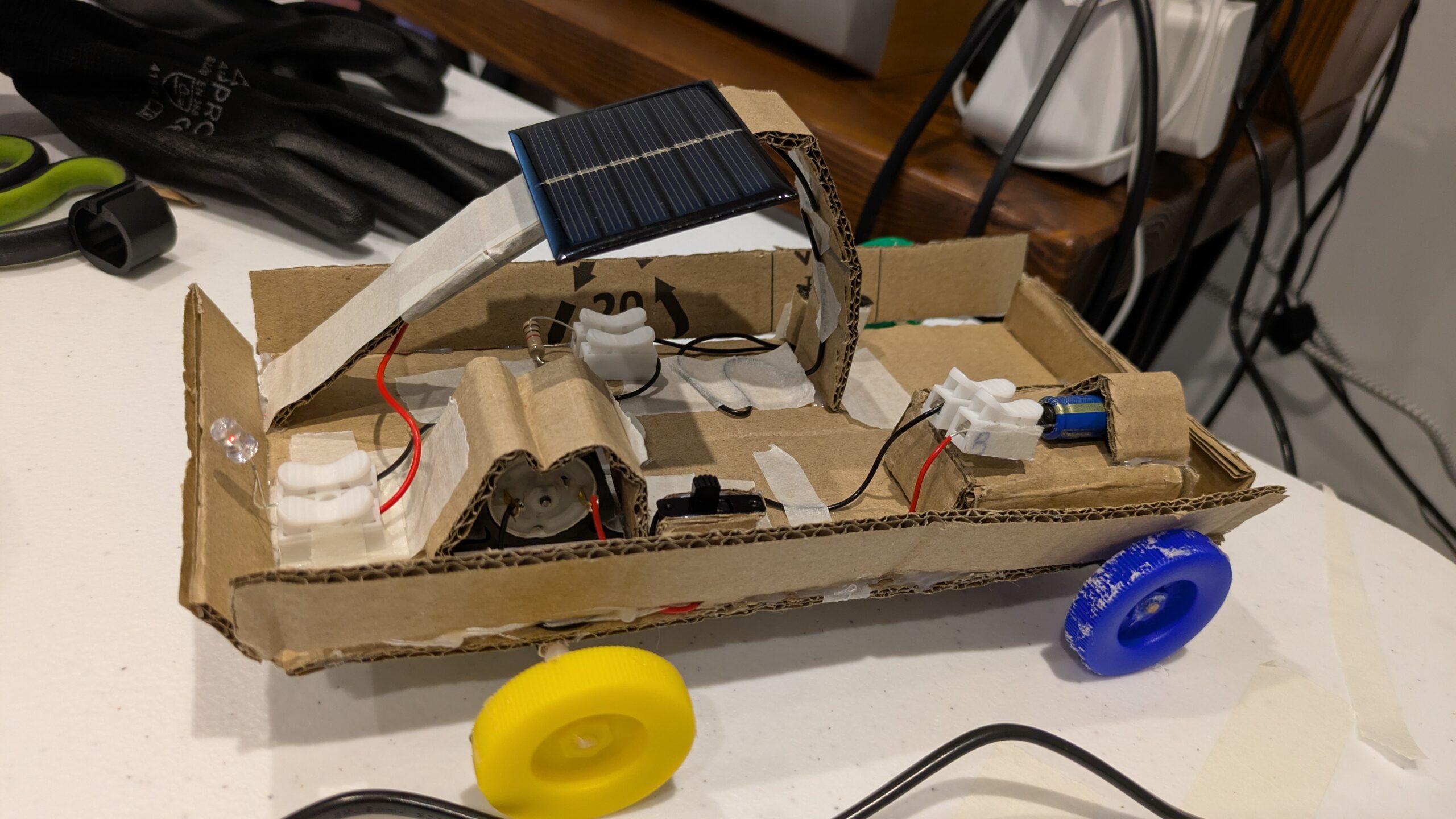 Cardboard solar-powered toy car model